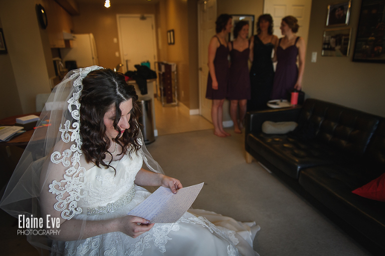 Bride reading love note photo